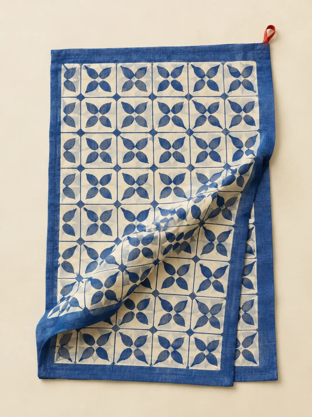Blue Tile Tablecloth laid flat, showing every piece in the set