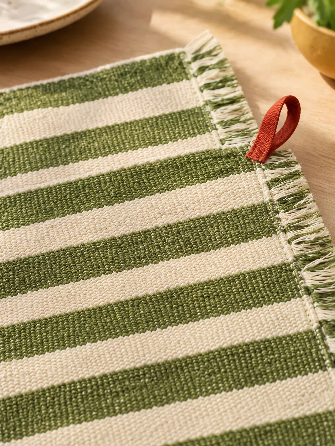 Fringe Stripe Placemats, Set of 4 close up: edge finish and red corner loop