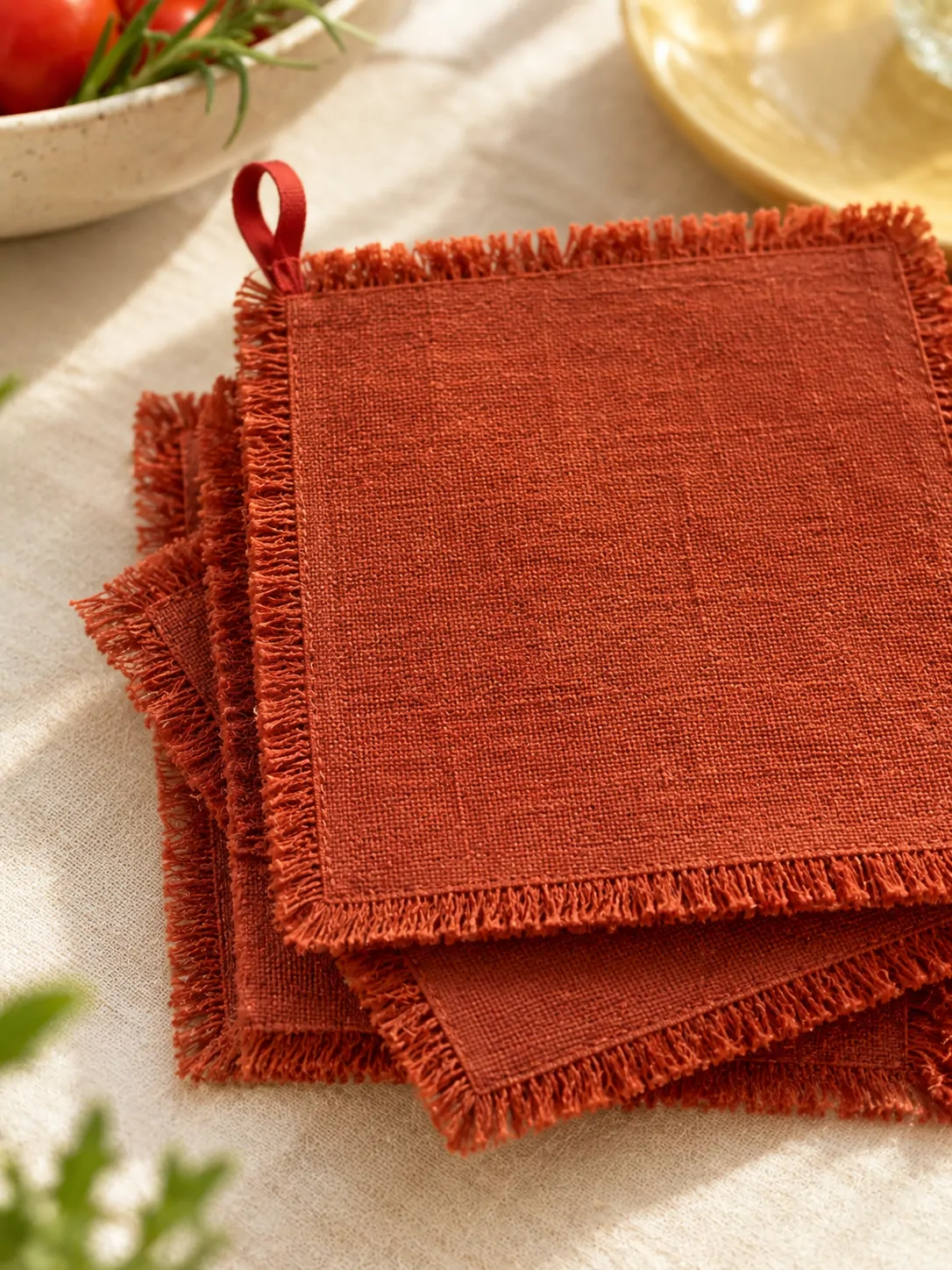 Fringed Napkins, Set of 4 close up: edge finish and red corner loop