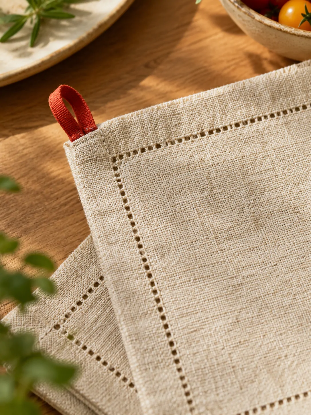 Hemstitch Napkins, Set of 4 close up: edge finish and red corner loop