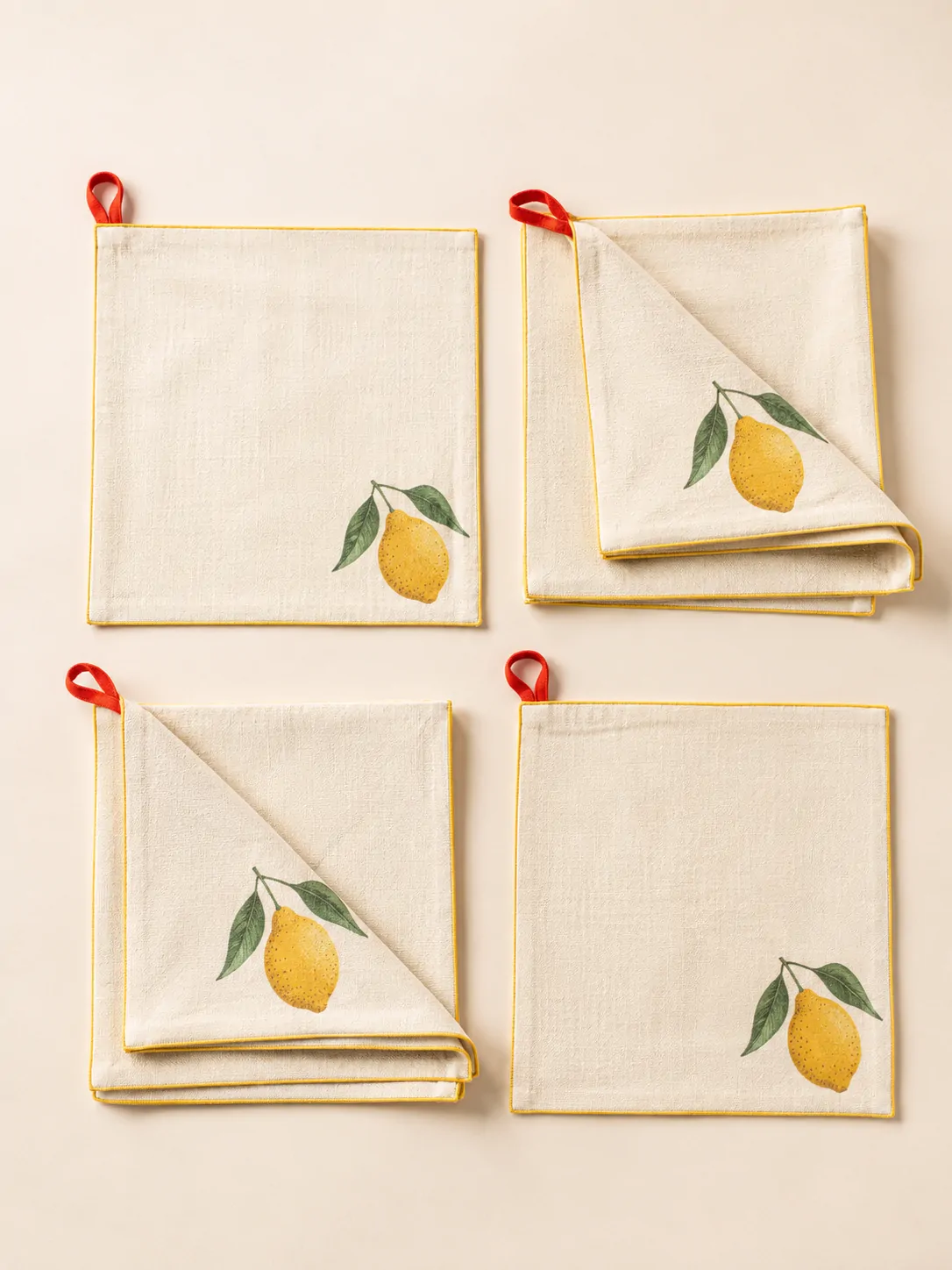 Lemon Corner Napkins, Set of 4 laid flat, showing every piece in the set