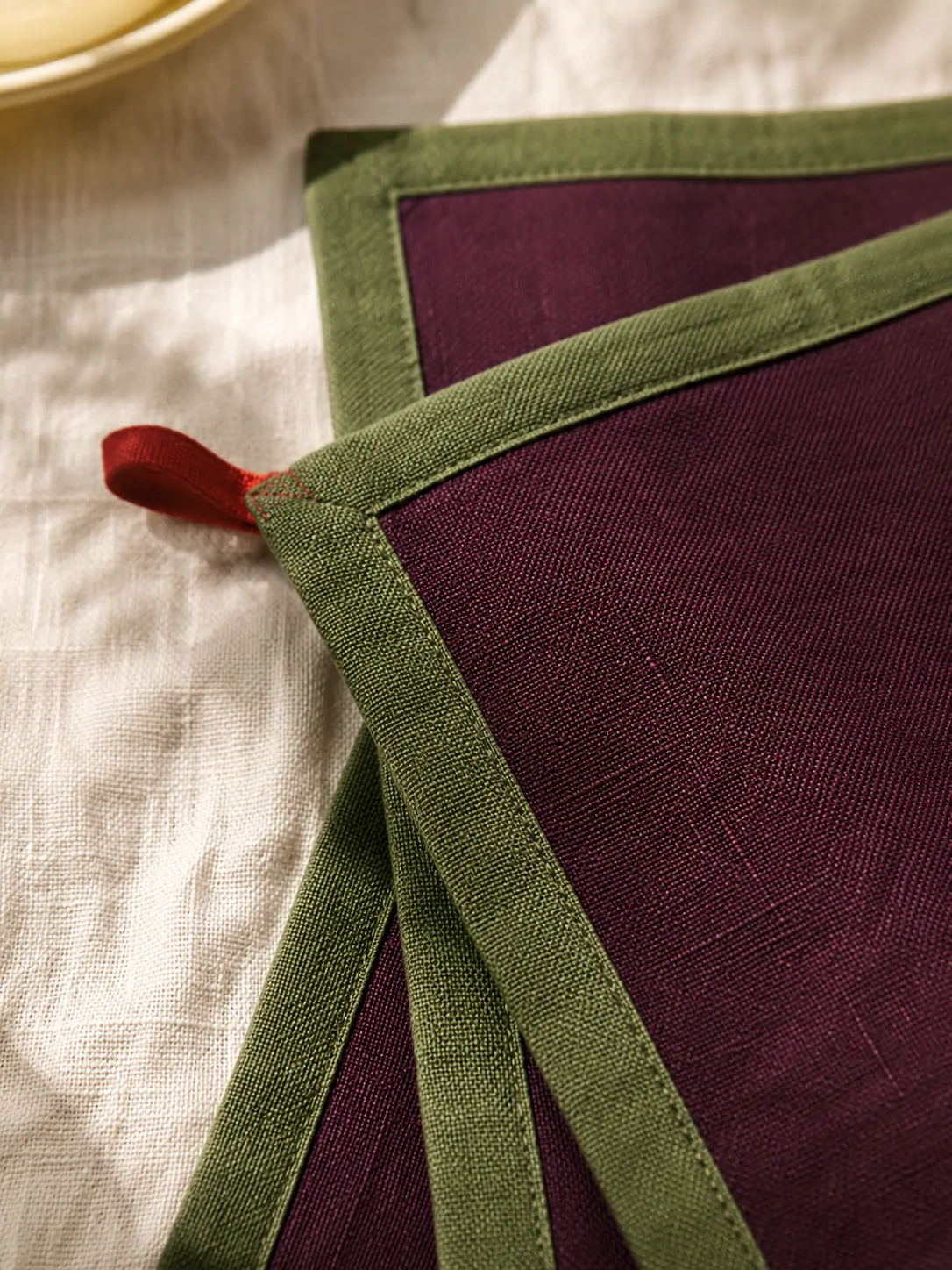 Oversized Napkins, Set of 2 close up: edge finish and red corner loop