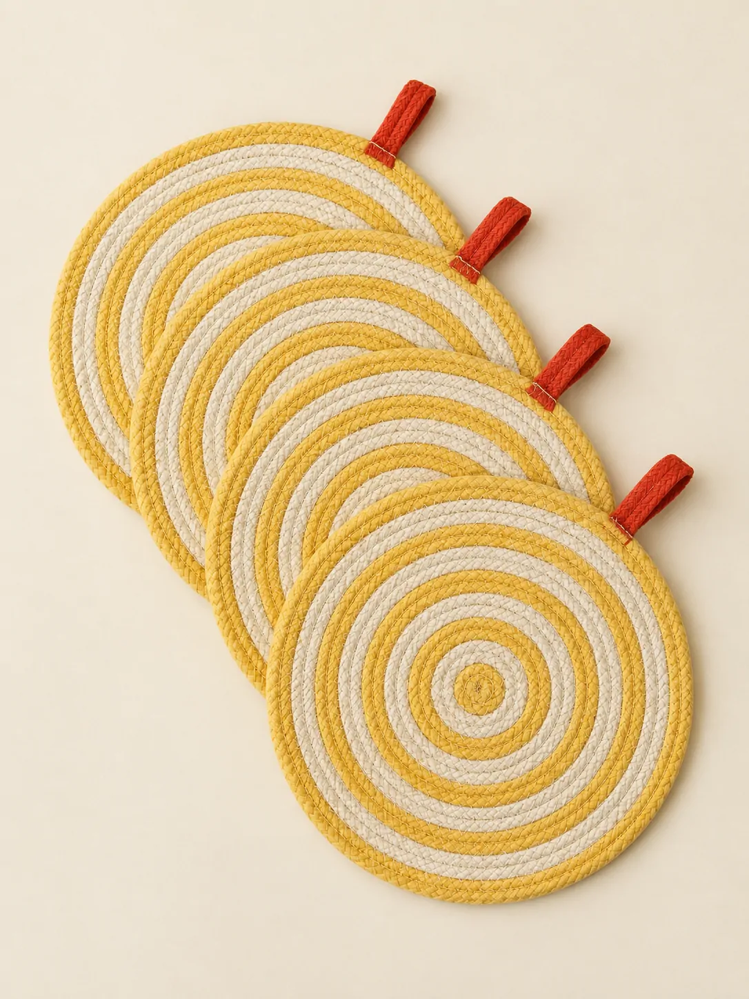 Round Braided Placemats, Set of 4 laid flat, showing every piece in the set