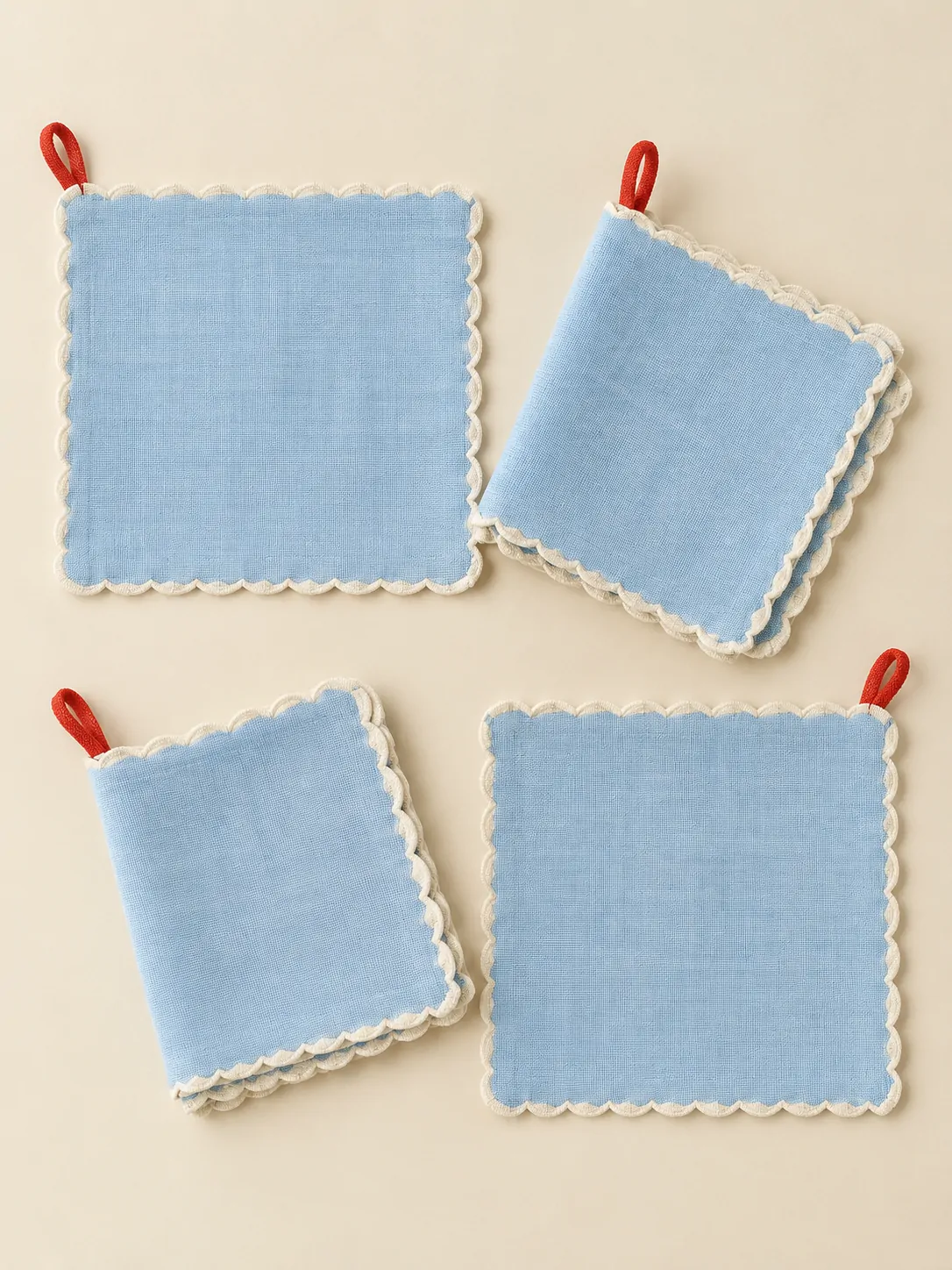 Scallop Napkins, Set of 4 laid flat, showing every piece in the set
