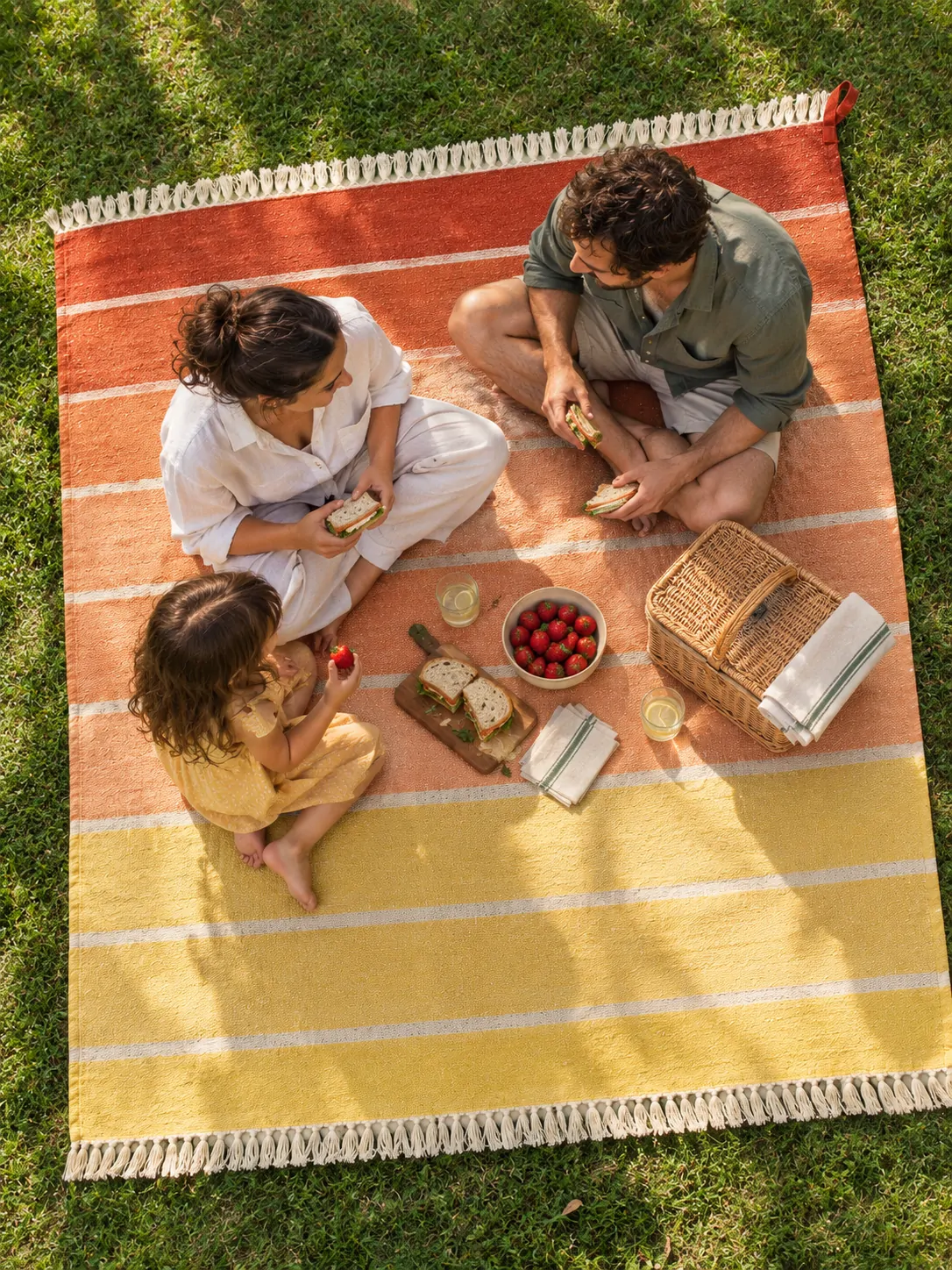 Sunset Stripe Picnic Cloth on a laid weekend table